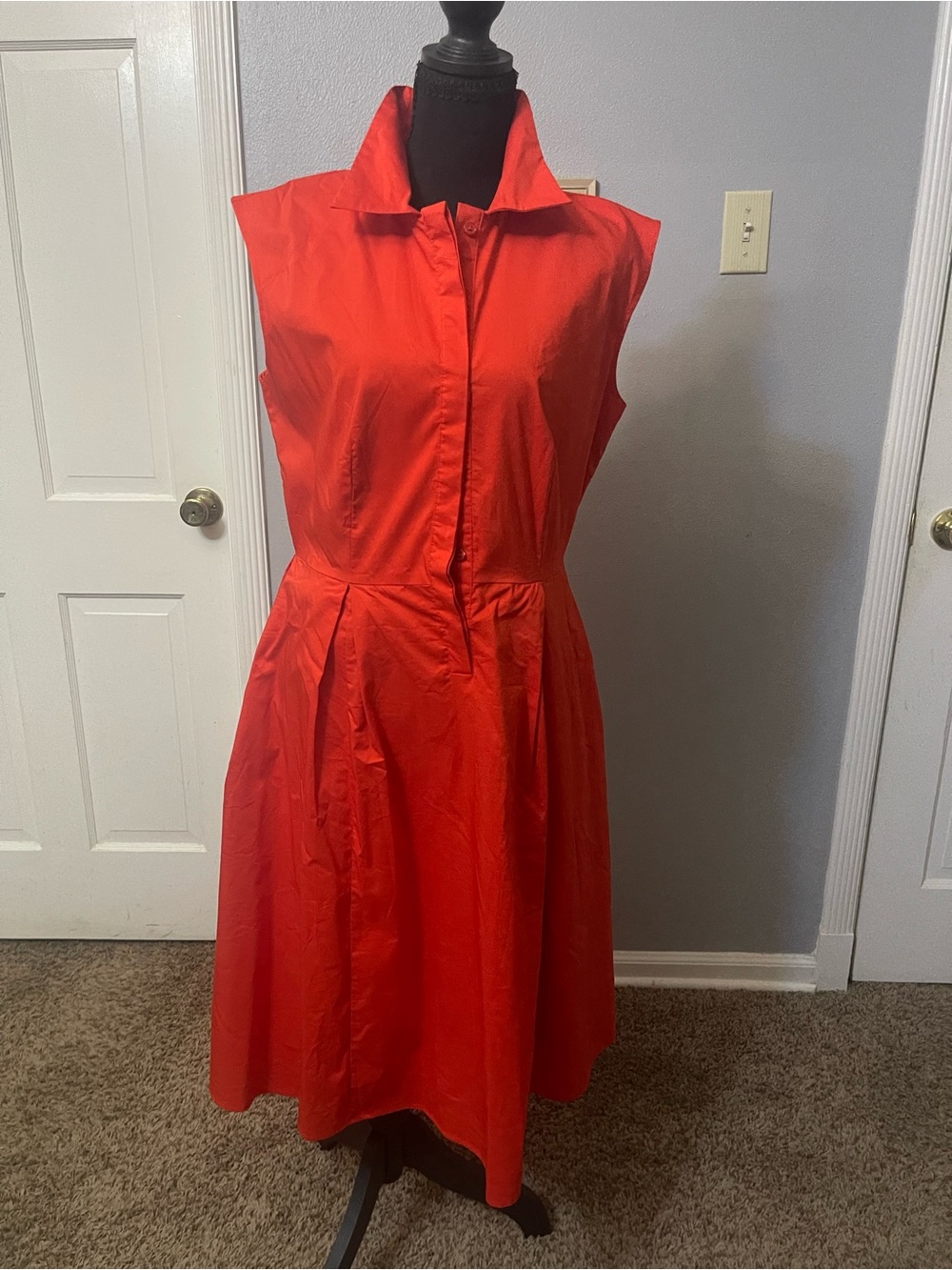 Sleeveless fit and flare dress with pockets